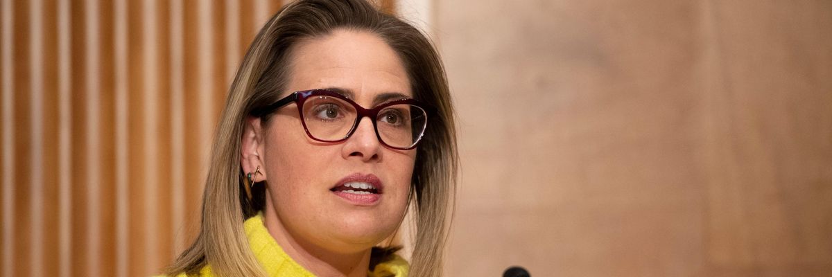 Sen. Kyrsten Sinema speaks during a hearing