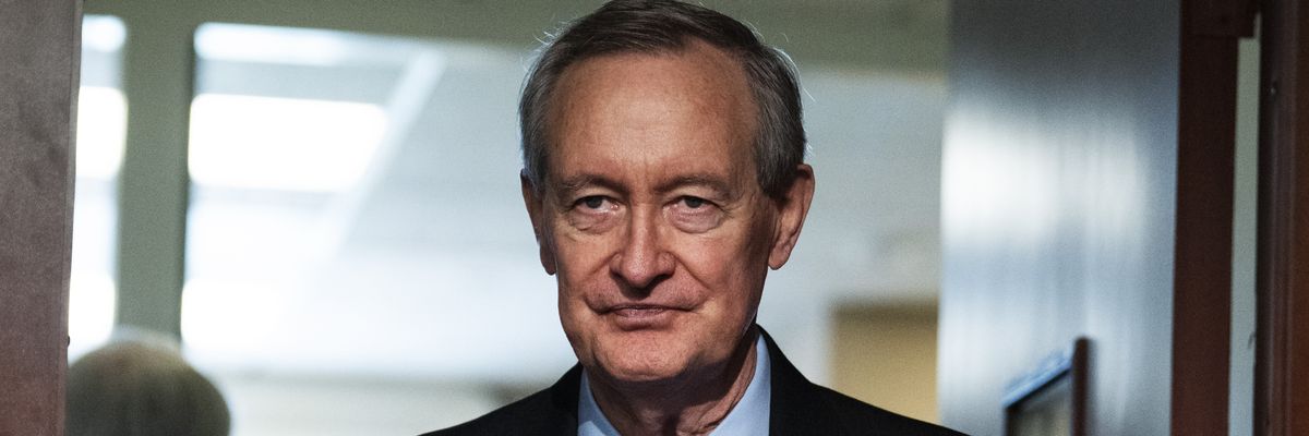 Sen. Mike Crapo arrives for a news conference