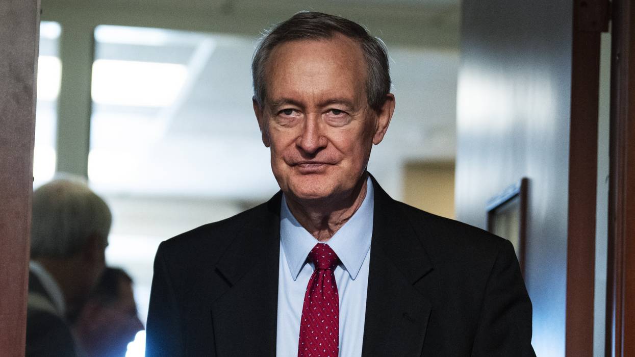 Sen. Mike Crapo arrives for a news conference