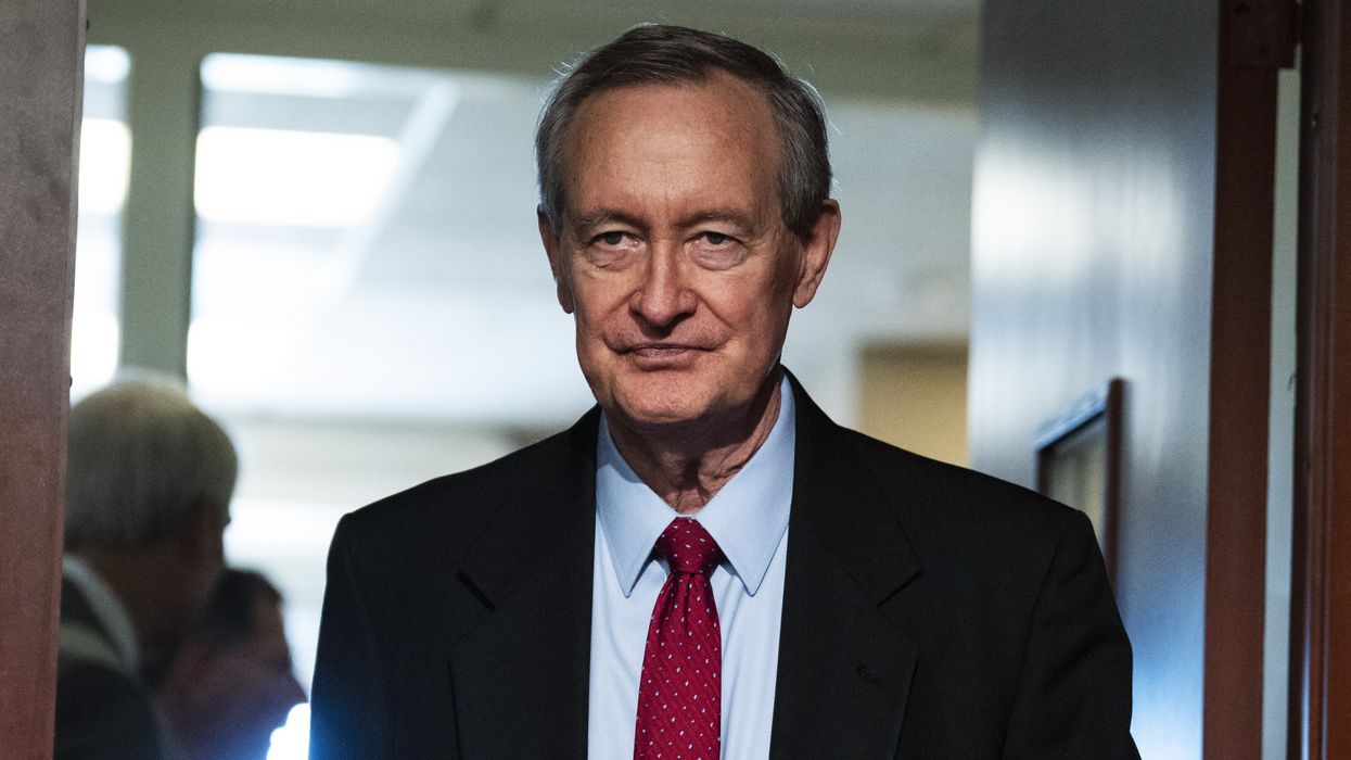 Sen. Mike Crapo arrives for a news conference