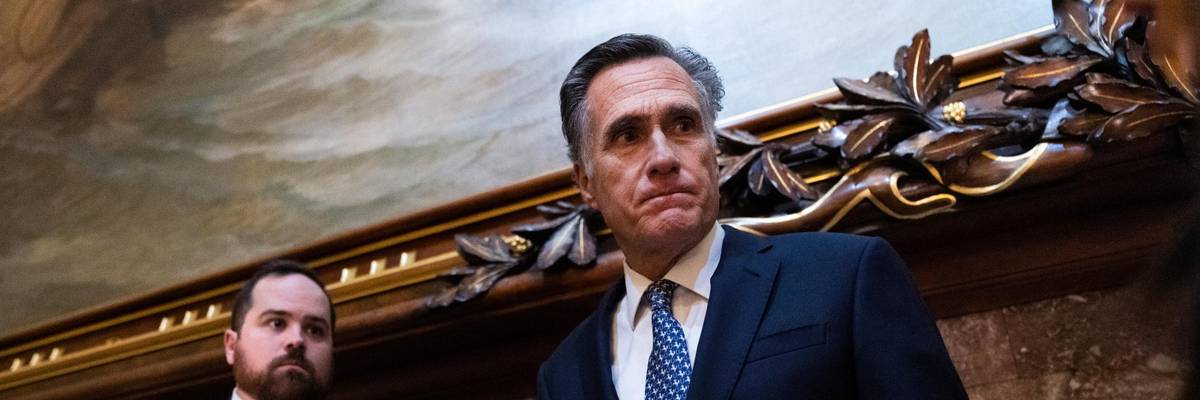 Sen. Mitt Romney speaks to reporters