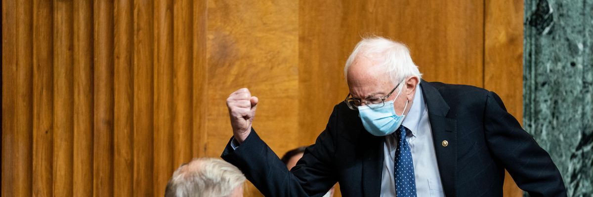 Senate Budget Committee Chairman Bernie Sanders (I-Vt.) and ranking member Sen. Lindsey Graham (R-S.C.) bump elbows prior to a hearing in Washington, D.C. on February 10, 2021.