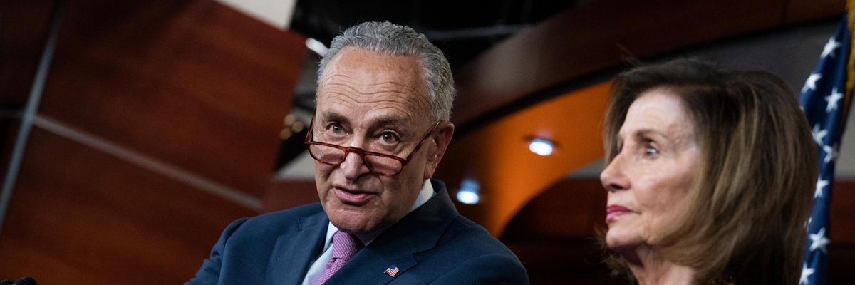 Senate Majority Leader Chuck Schumer and House Speaker Nancy Pelosi attend a briefing
