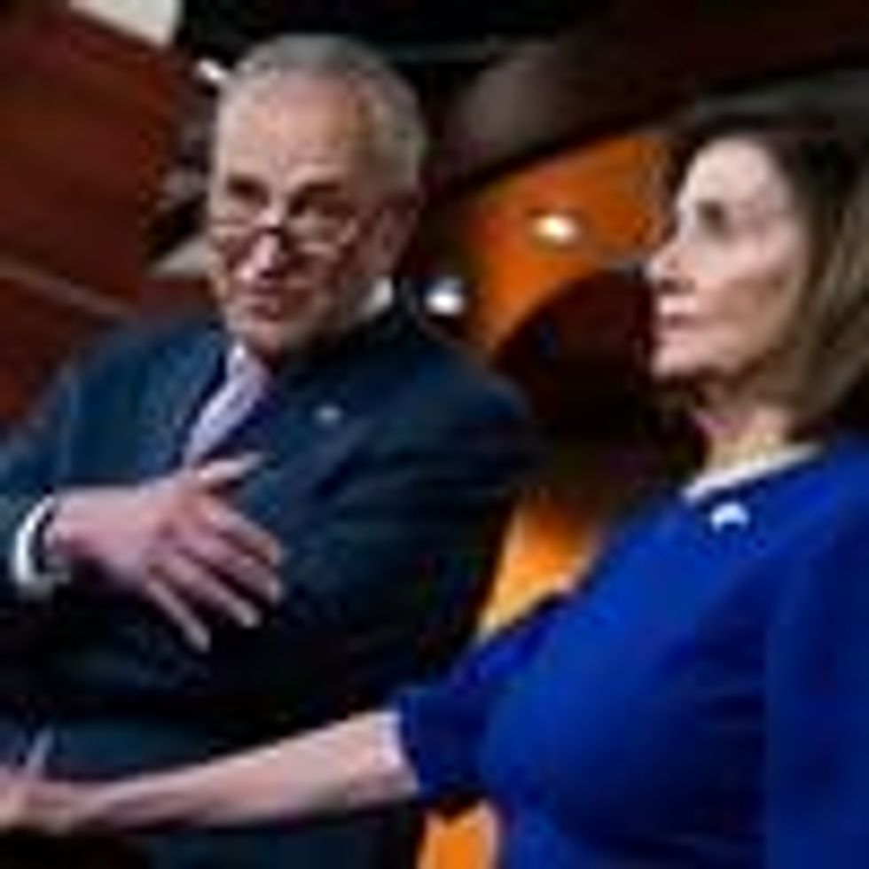 Senate Majority Leader Chuck Schumer and House Speaker Nancy Pelosi speak to reporters