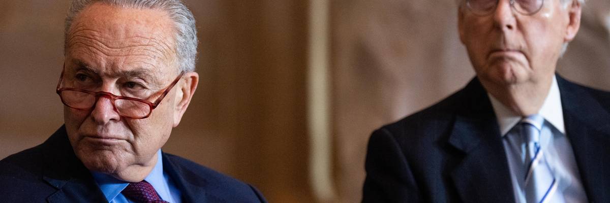 Senate Majority Leader Chuck Schumer (D-N.Y.) and Senate Minority Leader Mitch McConnell (R-Ky.) attend the Congressional Gold Medal Ceremony in the Capitol Rotunda on December 6, 2022.