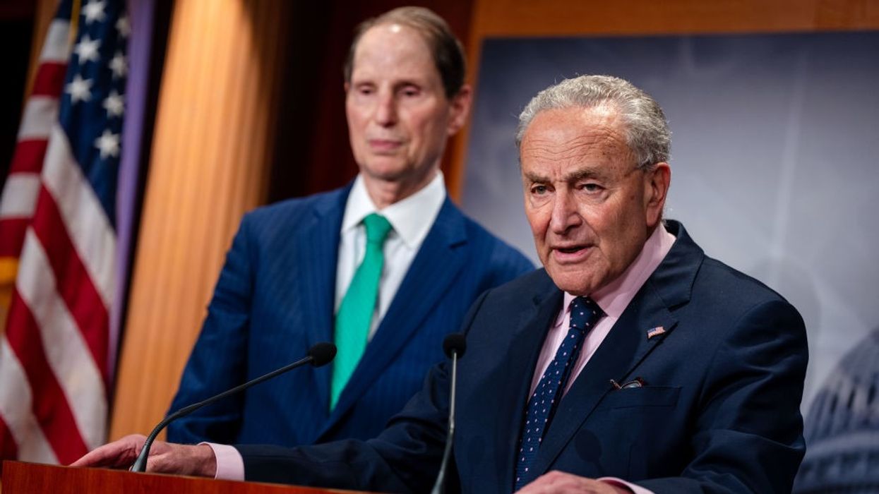 Senate Majority Leader Chuck Schumer (D-N.Y.) at a lectern