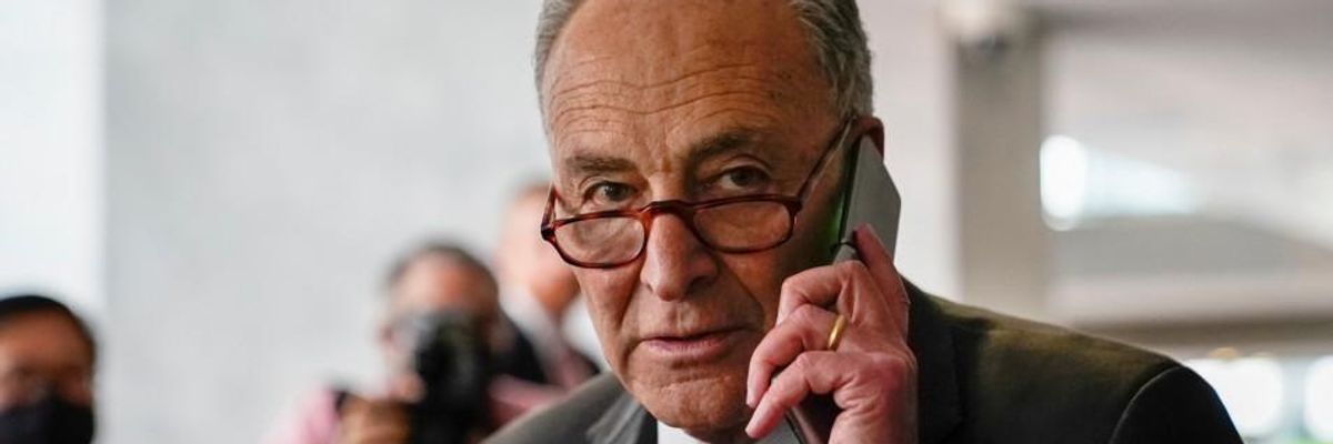 Senate Majority Leader Chuck Schumer on the phone