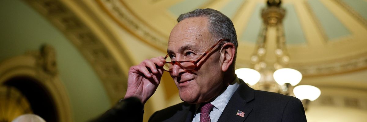 Senate Majority Leader Chuck Schumer speaks to reporters