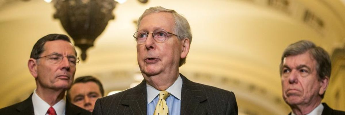 With Nation's Attention on Democratic Debate, McConnell Advances Over a Dozen Lifetime Trump Judges