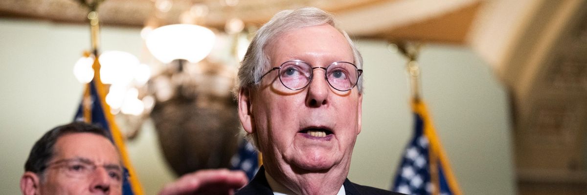 Senate Minority Leader Mitch McConnell speaks at a press conference