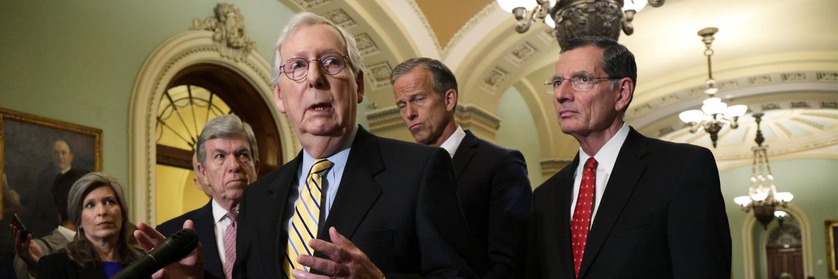 Senate Minority Leader Mitch McConnell speaks at a press conference