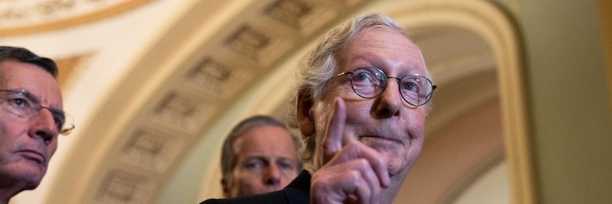Senate Minority Leader Mitch McConnell speaks during a news conference.