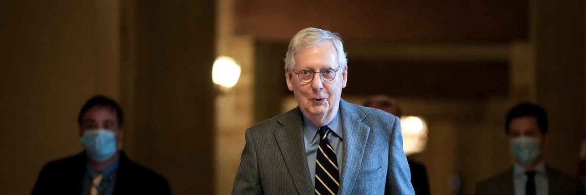 Senate Minority Leader Mitch McConnell walks in the U.S. Capitol