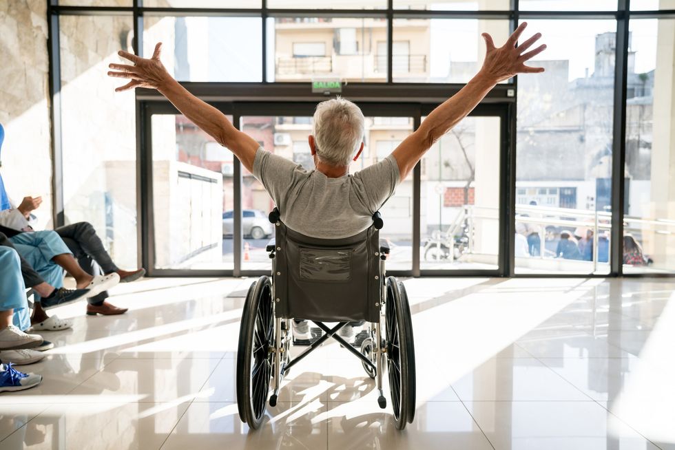Senior man leaving clinic.