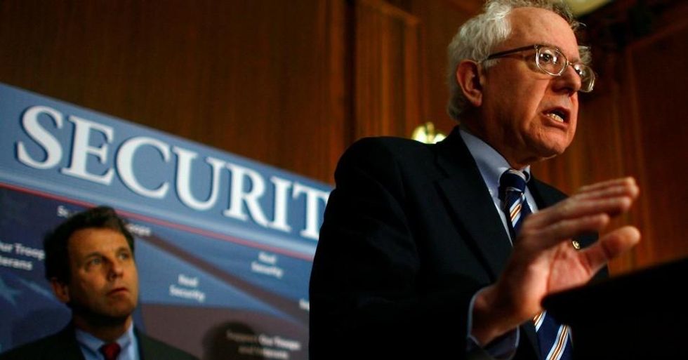 Sens. Bernie Sanders (I-Vt.) and Sherrod Brown (D-Ohio) were among several lawmakers who demanded on Tuesday an investigation into CFPB Director Mick Mulvaney's political activities. (Photo: Win McNamee/Getty Images)