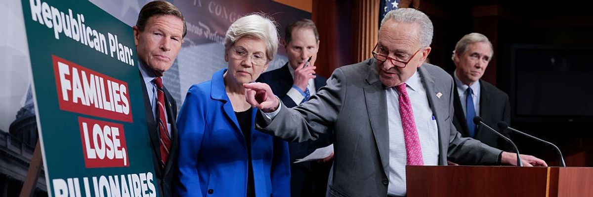 Sens. Elizabeth Warren and Chuck Schumer