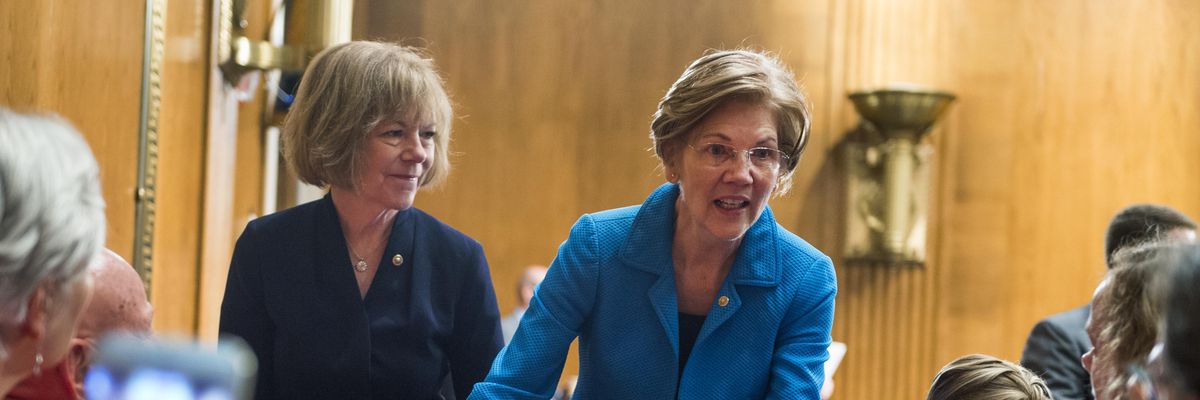 Sens. Elizabeth Warren (D-Mass.) and Tina Smith (D-Minn.) attend a Senate Health, Education Labor, and Pensions Committee hearing in Washington, D.C. on September 25, 2018.