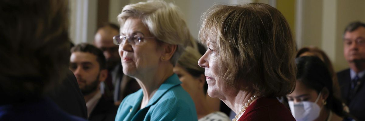 Sens. Elizabeth Warren (D-Mass.) and Tina Smith (D-Minn.) listen during a news conference at the U.S. Capitol on September 7, 2022. 