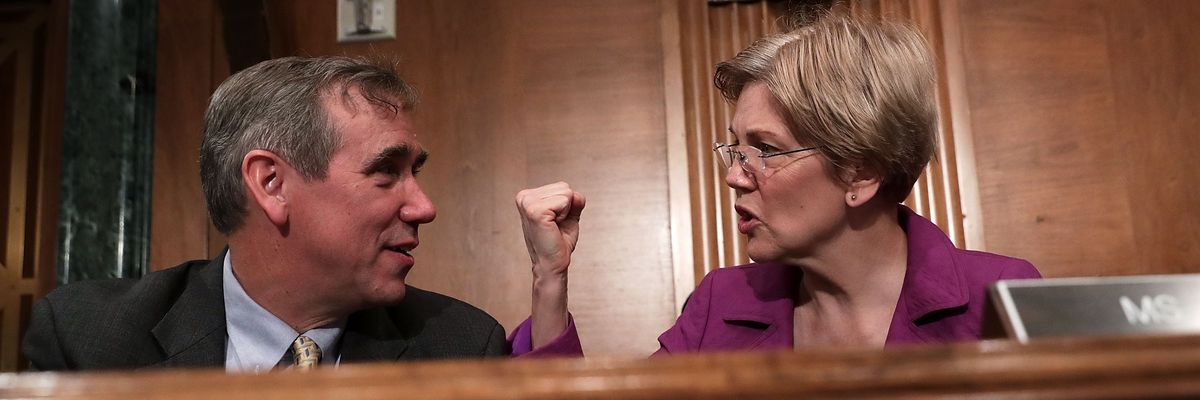 Sens. Jeff Merkley and Elizabeth Warren speak before a hearing