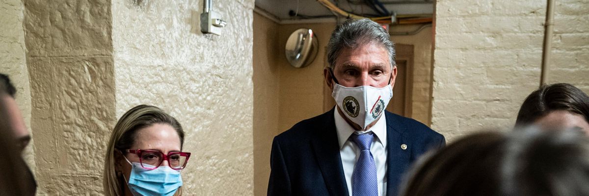 Sens. Kyrsten Sinema and Joe Manchin speak to reporters