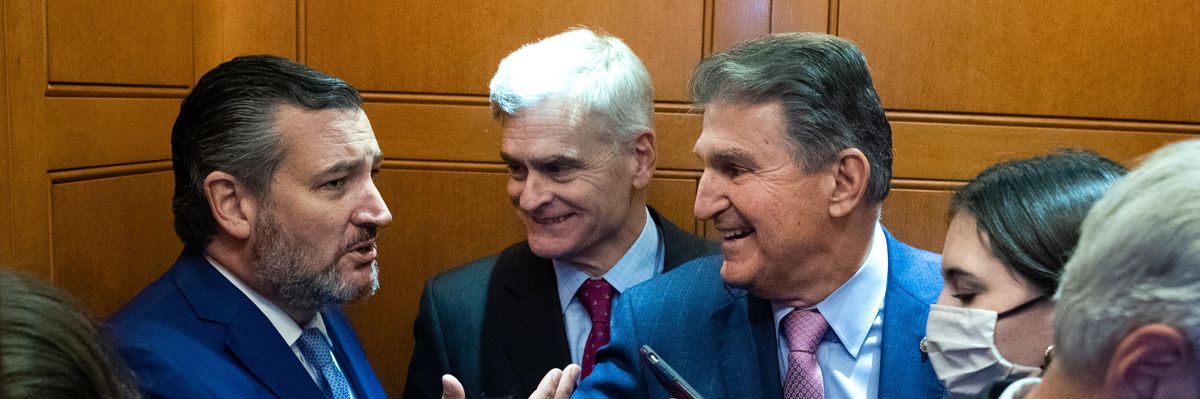 Sens. Ted Cruz (R-Texas), left, and Joe Manchin (D-W.Va.), right, talk during an elevator ride at the U.S. Capitol on September 22, 2021.