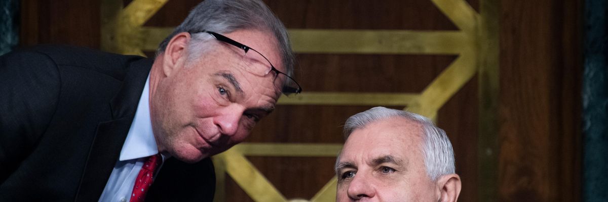 Sens. Tim Kaine and Jack Reed speak during a hearing