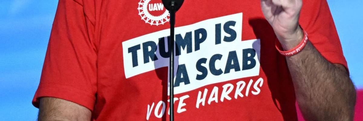 Shawn Fain's t-shirt reads "Trump Is a Scab / Vote Harris"
