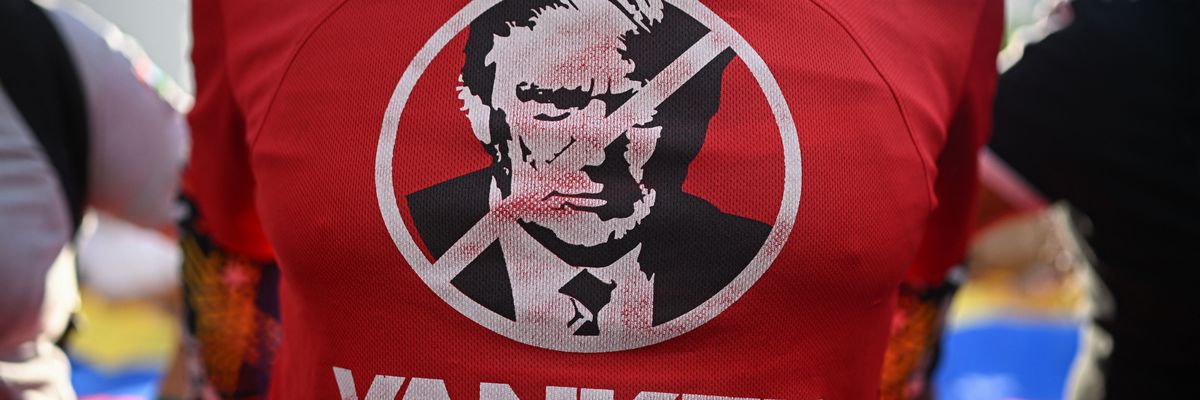 Shirt in Venezuela with exed-out image of Trump.