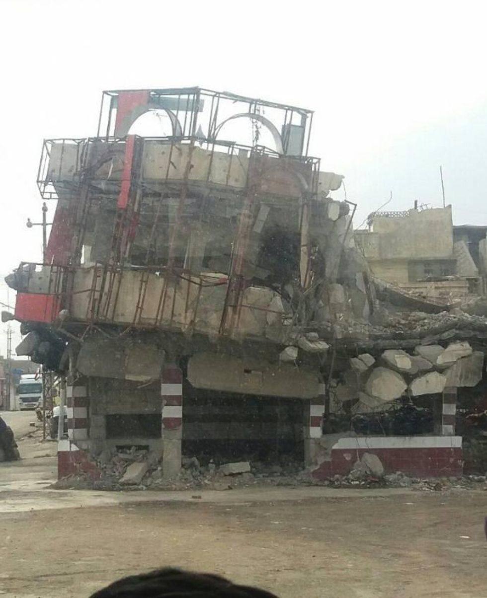 Shop remains open in area of Mosul decimated by bombing, March, 2018. Photo credit: Abu Mohammed.