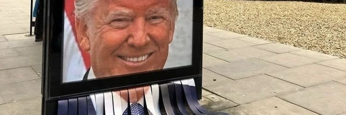 Shredded image of Trump on UK bus stop.