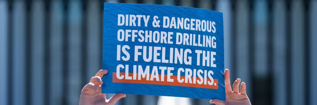 Sign in front of White House says "Dirty & Dangerous Offshore Drilling Is Fueling the Climate Crisis"