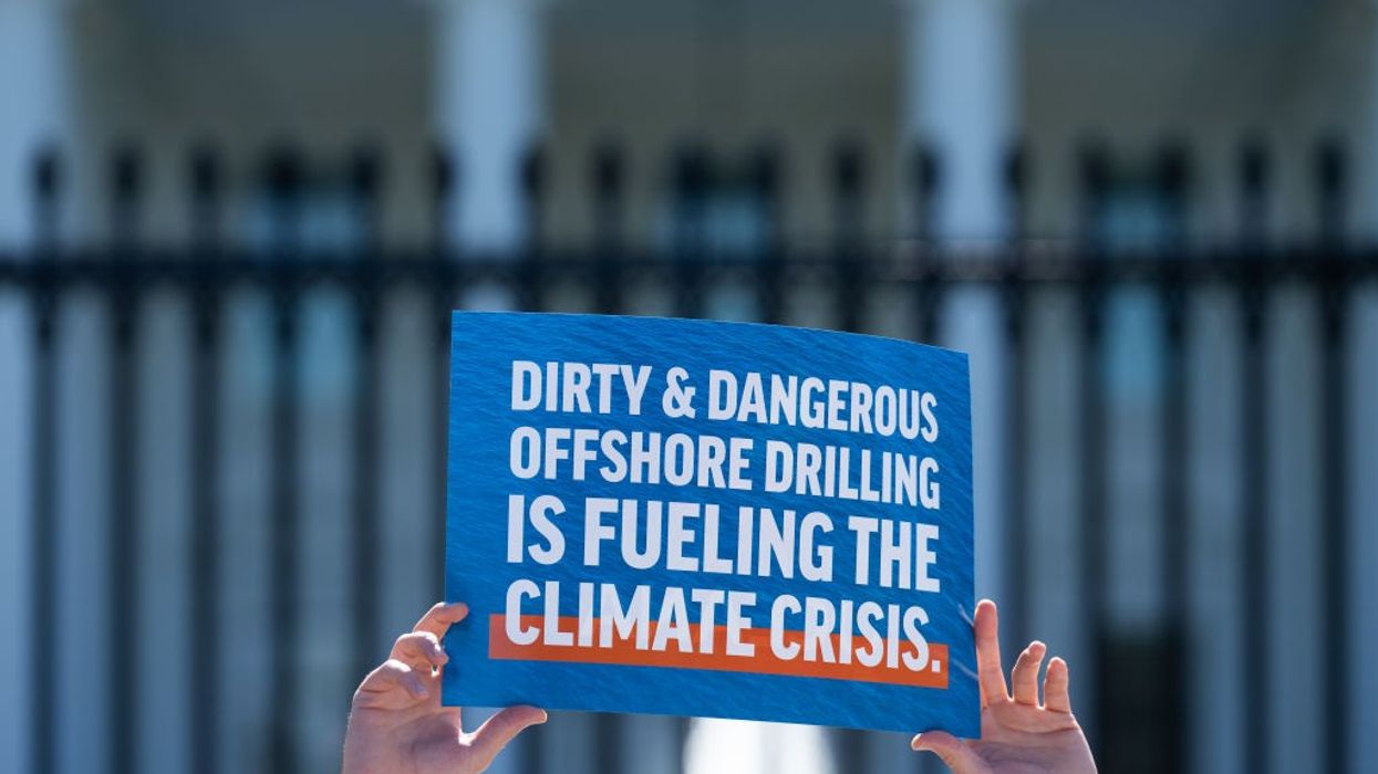 Sign in front of White House says "Dirty & Dangerous Offshore Drilling Is Fueling the Climate Crisis"