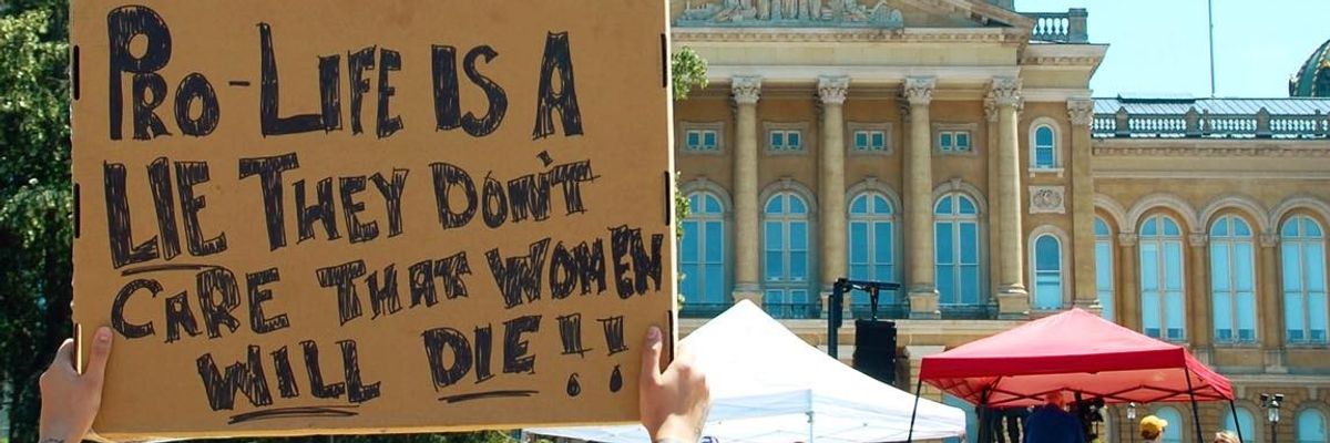 Sign opposing Iowa abortion ban