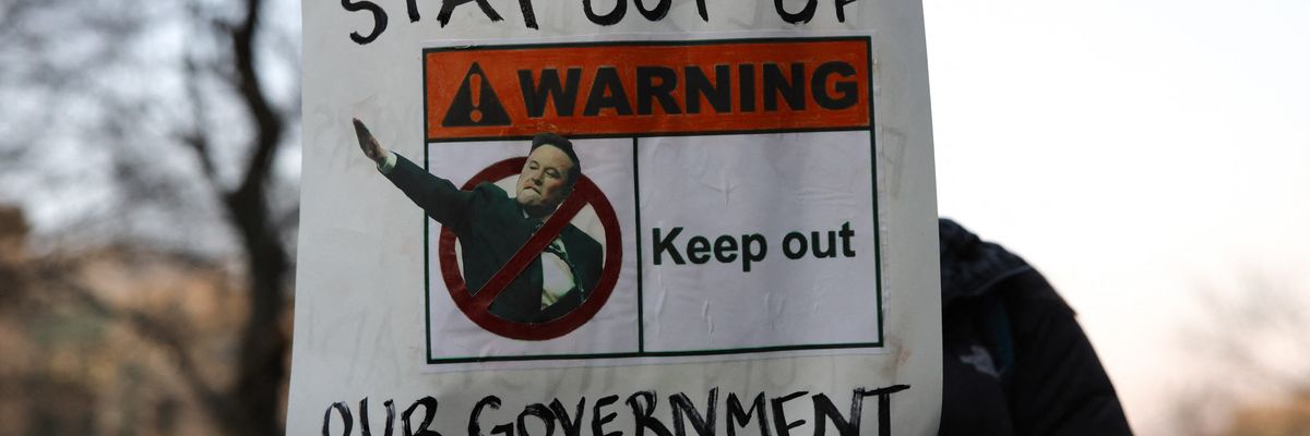 Sign protesting Elon Musk.