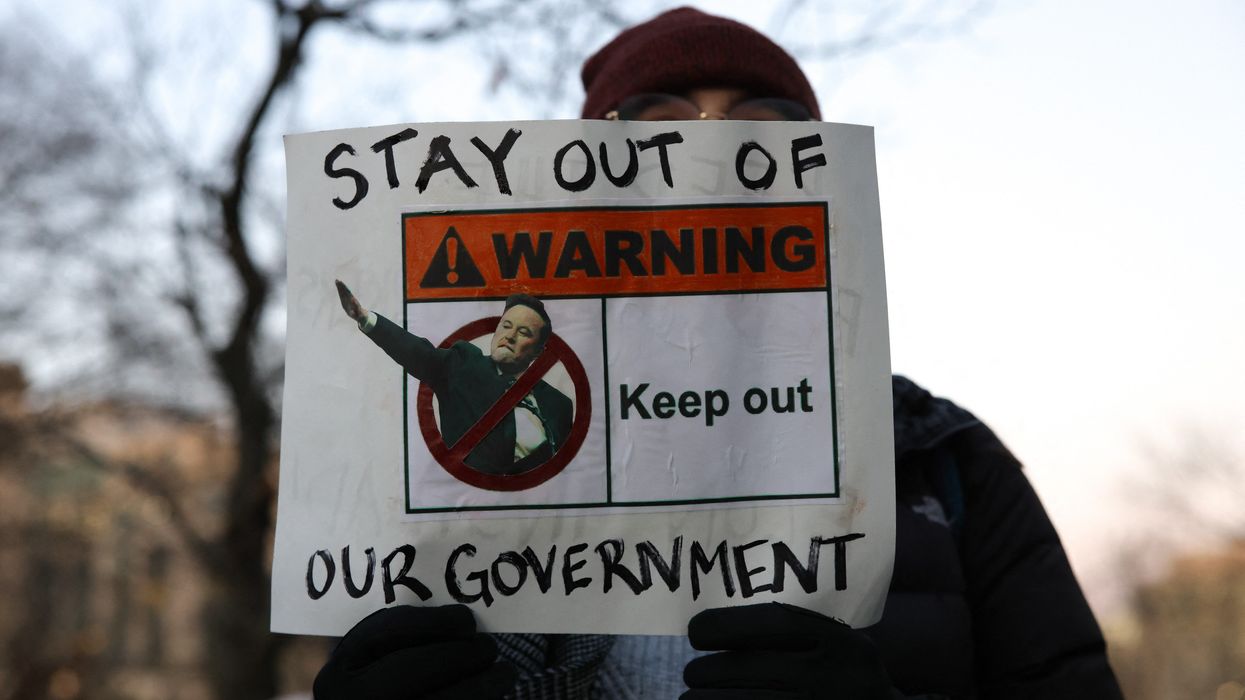 Sign protesting Elon Musk.