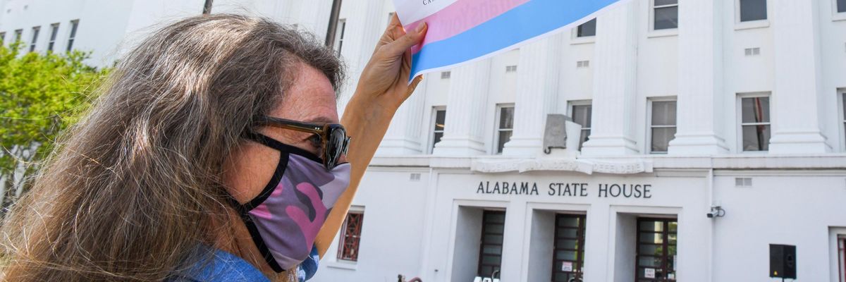 Sign reading "We love our trans youth"