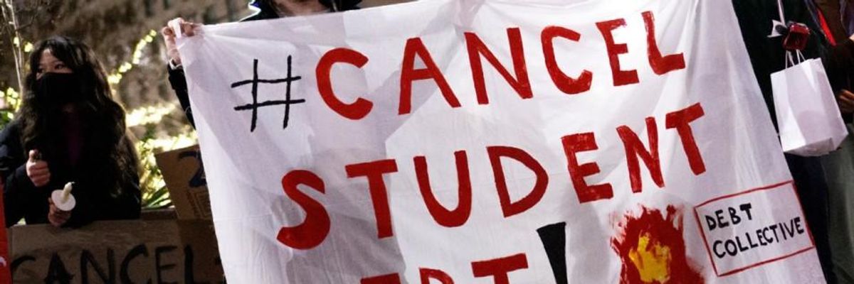 Sign reads Cancel Student Debt