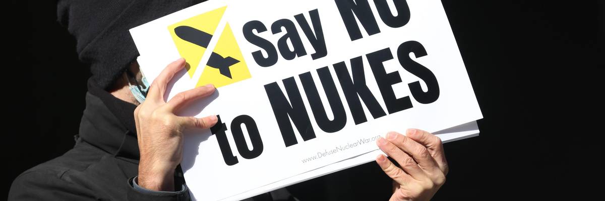 Sign reads "Say NO to Nukes."