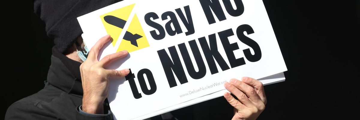 Sign reads "Say NO to Nukes."