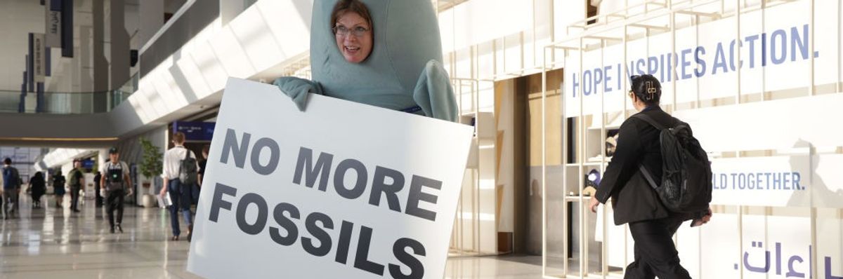 Sign says "No more fossils"