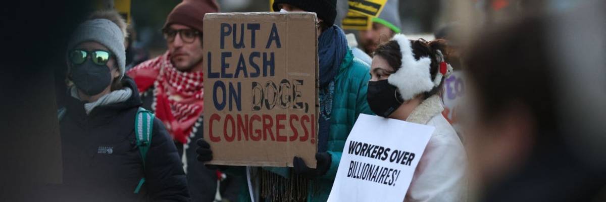 sign says, put a leash on DOGE