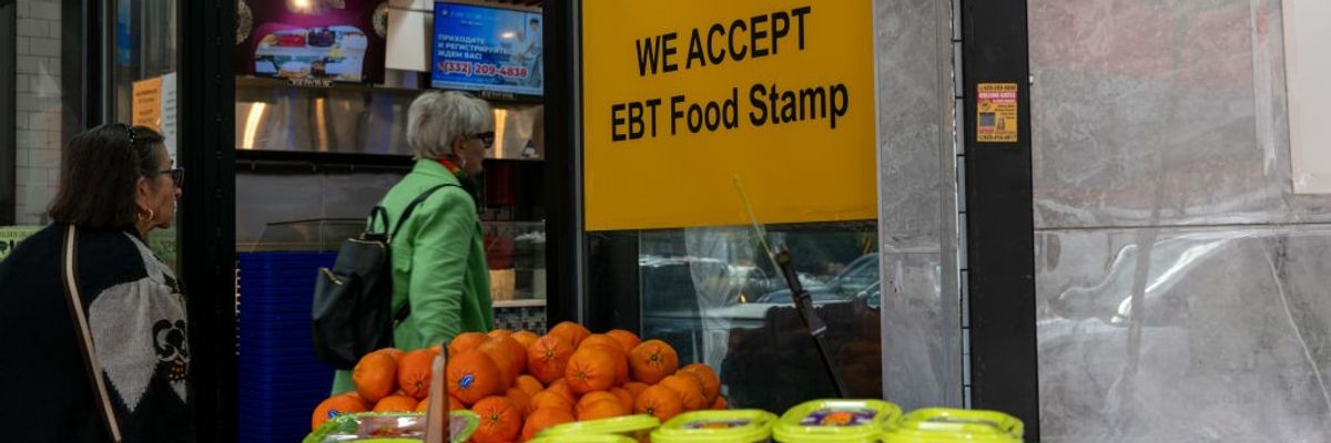 sign says shop accepts food stamps