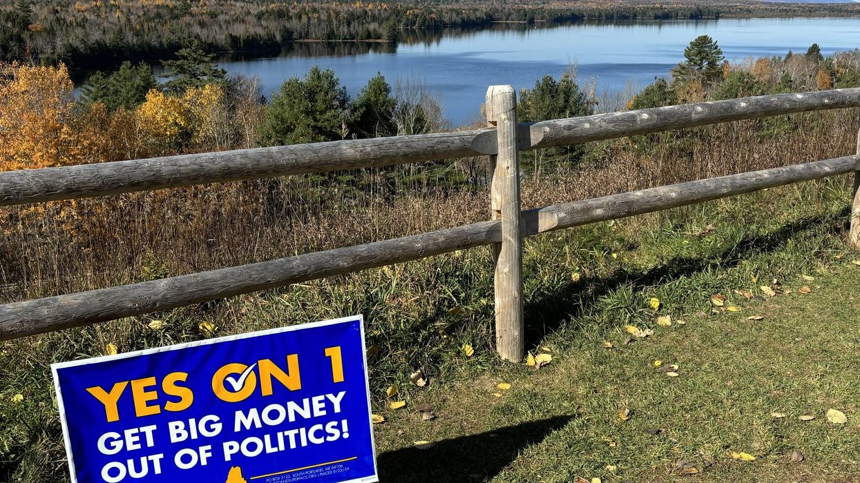 sign says: Yes on 1, get big money out of politics!