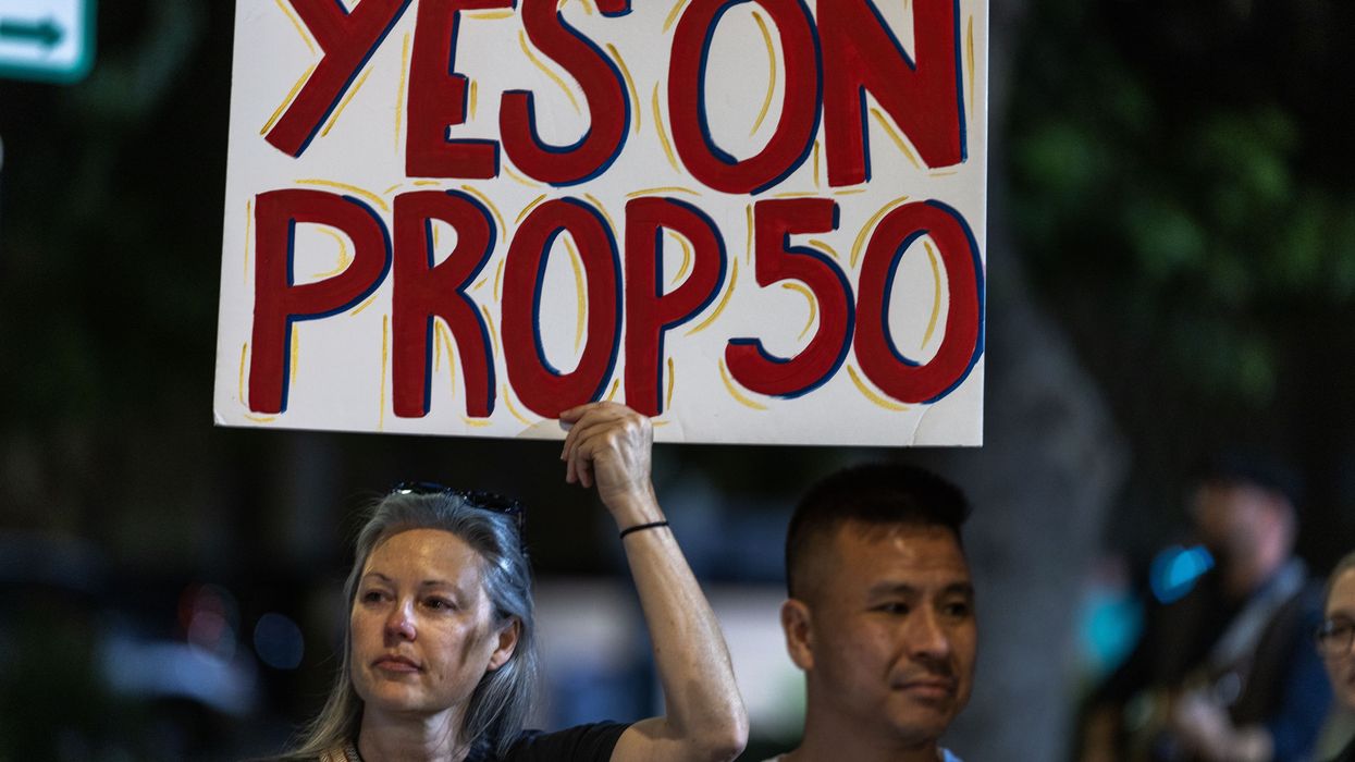 sign says: yes on prop 50