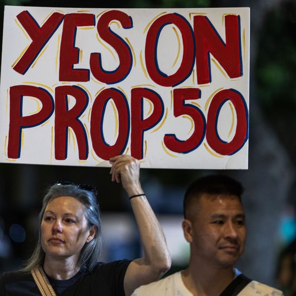 sign says: yes on prop 50