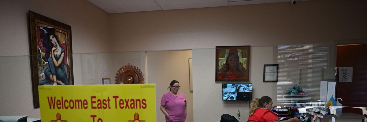 Sign welcoming patients to abortion clinic