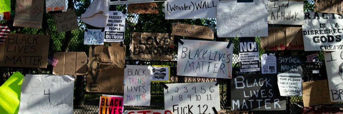 'Whose Fence? Our Fence!': Trump's New White House Barrier Transformed Into Black Lives Matter Memorial