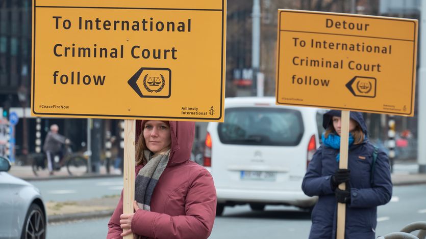 Signs says "Detour: To the International Criminal Court follow"
