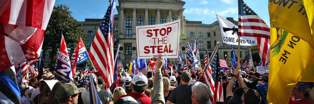 Signs that says "Stop the Steal" at a pro-Trump rally