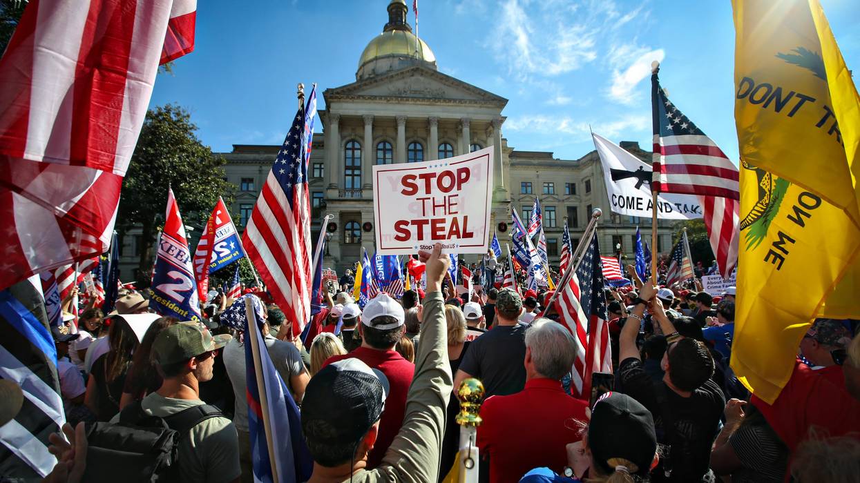 Signs that says "Stop the Steal" at a pro-Trump rally